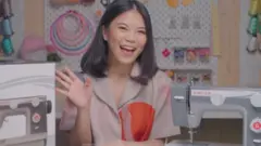 menjahit