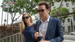 Bijou Phillips and Danny Masterson arrive in court for his rape retrial in May