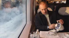 Путін