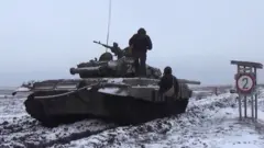 Russian TV shows tank exercises close to the border with Ukraine on 14 Jan 2022
