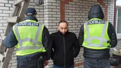 затриманий