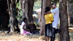 Young Sri Lankan couples spend time with each other on Valentine's Day in Vihara Maha Devi park in Colombo on February 14, 2010