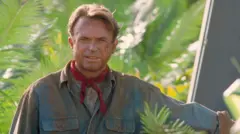 Uma captura de tela do ator Sam Neill em Jurassic Park.