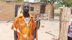 Survivor of di Gonar Rogo attacks with house wey burn for im back