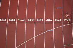 Beatrice Chebet crosses the finish line.
