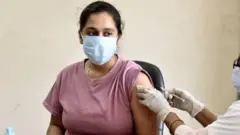 कोरोना लस