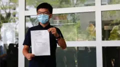 黃之鋒、楊岳橋等12名香港民主派人士被取消立法會參選資格