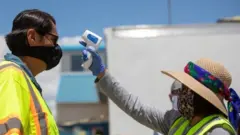 Navajo Nation President Jonathan Nez has his temperature checked on May 27, 2020 in New Mexico, US