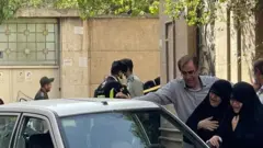 کانال تلگرامی سپاه، عکسی از خانواده و اقوام حسن صیاد خدایی در صحنه تیراندازی منتشر کرد