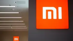 Logo Xiaomi tại một cửa hàng ở Thượng Hải, Trung Quốc vào ngày 12 tháng 5 năm 2021