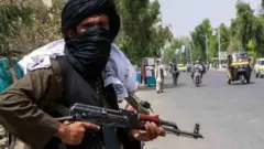 A Taliban fighter on patrol in Kandahar