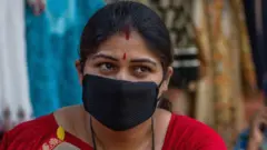 મહિલા