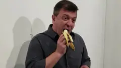 David Datuna devours the banana art