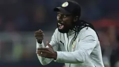 L'entraîneur du Sénégal Aliou Cissé sur le banc de touche.