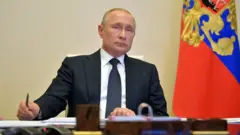 Путин