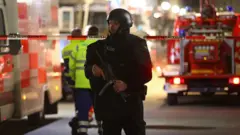 La police sur l'une des scènes du crime, après la fusillade à Hanau