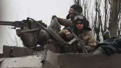 Tanks move into the city, after Russian President Vladimir Putin authorized a military operation in eastern Ukraine, in Mariupol, 24 February 2022
