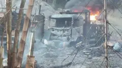 আগুনে পোড়া একটি গাড়ি