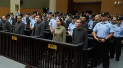 மிங் குடும்பத்தைச் சேர்ந்த மொத்தம் 39 பேருக்கு திங்கட்கிழமை அன்று தண்டனை விதிக்கப்பட்டது.