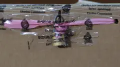 A locked paddle lock is seen on a taped ballot box as Chairman of Election Commission of Sri Lanka, Mahinda Deshapriya (unseen) explains how the Ballot boxes have been re-designed to stop any election fraud during a press conference at Colombo, Sri Lanka, on 03 August 2020