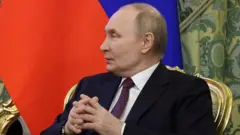 Путін