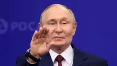 Russian President Vladimir Putin gestures during a meeting with nuclear industry representatives while visiting the All-Russian Scientific Research Institute Of Experimental Physics on August 22, 2025, in Sarov, Russia.