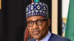 Late Nigeria’s president Muhammadu Buhari looking straight with his glasses on and hat