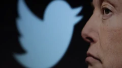 Elon Musk and Twitter logo