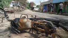 গুইমারা উপজেলার ক্ষতিগ্রস্ত রামসু বাজার