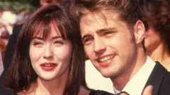 Jason Priestley y Shannen Doherty en 1991.