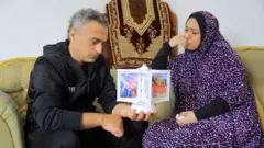 عرفات أبو عاصي وزوجته