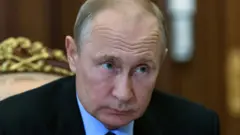 путин