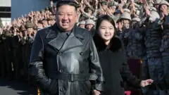 अपनी बेटी के साथ किम