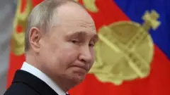 Путин