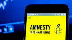 অ্যামনেস্টি ইন্টারন্যাশনাল লোগো