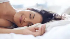 mujer durmiendo