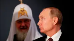 Patriark Cyril dan Vladimir Putin.
