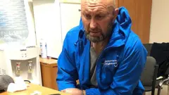 СКР опубликовал видео и фото задержанного