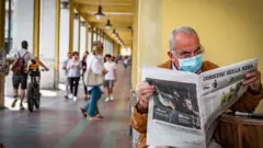 a man reading newspaper