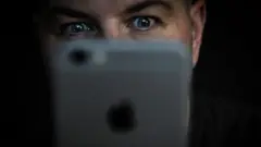 watching phone camera