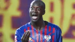 Yaya Toure playing for Qingdao Huanghai