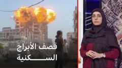 صورة لأبراج سكنية أثناء انفجارها