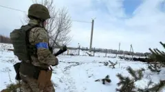 Ukrainian soldier in the snow
