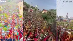 బిందెలతో వెళ్తున్న మహిళలు