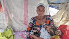 Noella Elizabeth, mère de 5 enfants, est réfugiée.