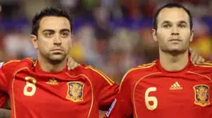 Xavi Hernández e Andrés Iniesta