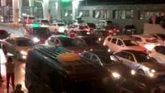 A queue or cars at a border checkpoint