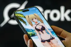 CHONGQING, CHINA - AUGUST 20: In this photo illustration, a smartphone shows the Grok app with the virtual character Ani on August 20, 2025 in Chongqing, China. Grok is an artificial intelligence application under Elon Musk's X Corp. and was developed following the rebranding of Twitter into X.
