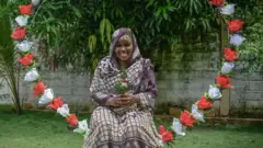 Wata mata ƴar ƙasar Madagascar a lokacin bikin ranar mata ta duniya a shekarar 2025