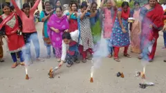 Women for India dey celebrate say 4 suspects of rape and murder don die